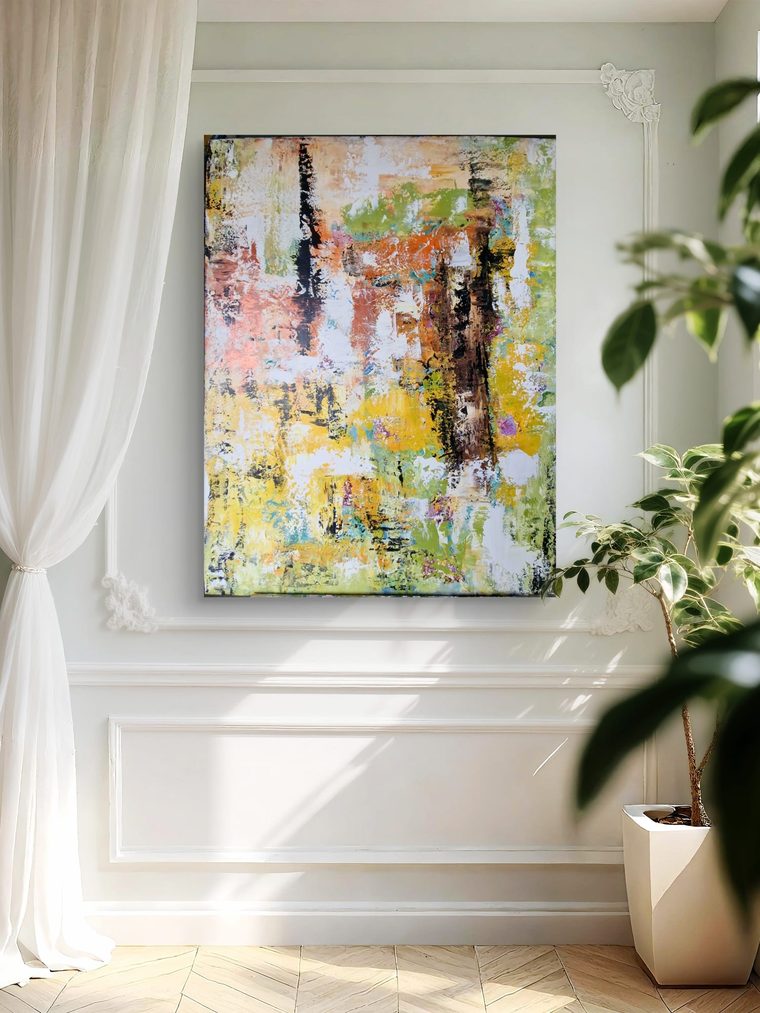 Frühlingslicht – abstraktes Acrylbild in Grün, Gelb und Orange – an der Wand im Raum